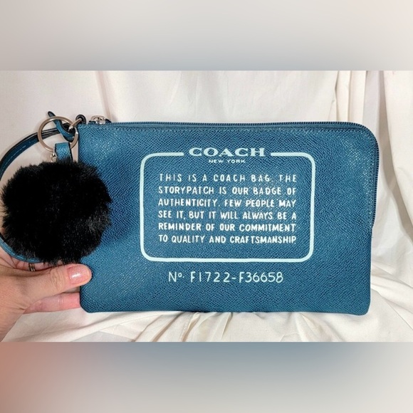 Coach 2017 Teal Large Story Patch Wristlet with Logo Tag and free Pom Pom! NWOT